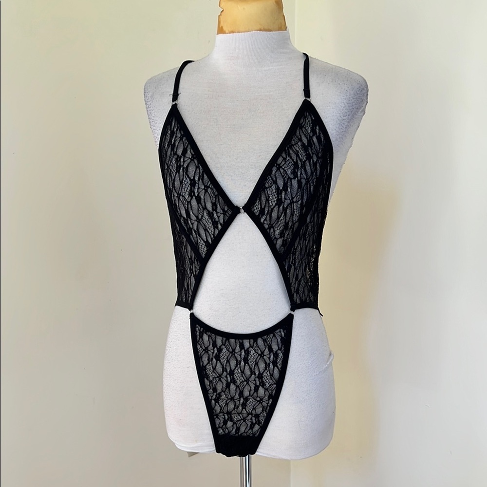 Elle Reve Nazanin black large cut out bodysuit.